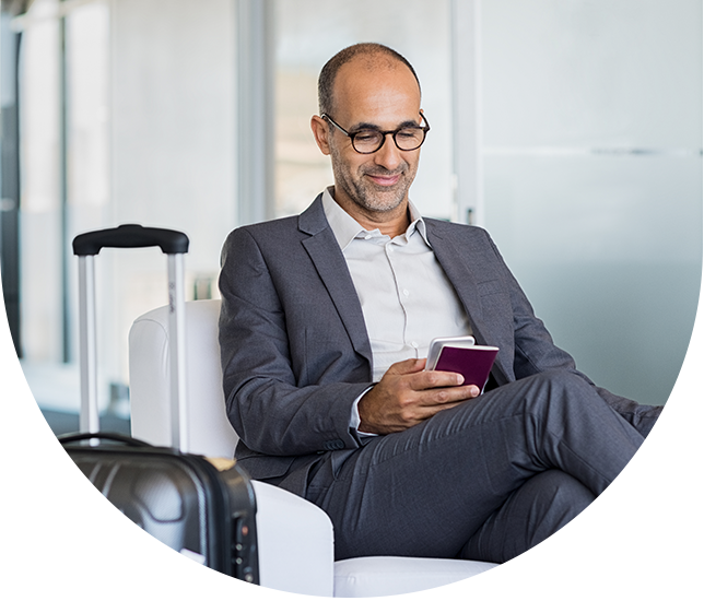 man banking while traveling