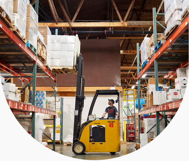 Forklift worker in warehouse