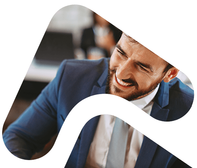 Man smiling at coffee table