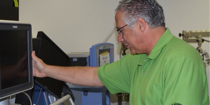 Man looking at a monitor