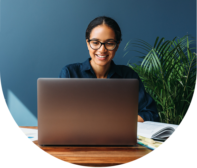 Business woman looking at laptop