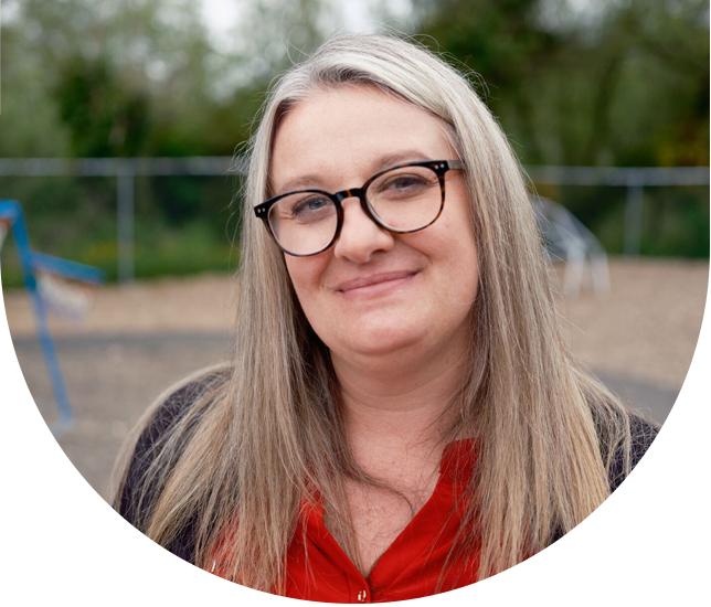Umpqua customer smiling outside early learning center