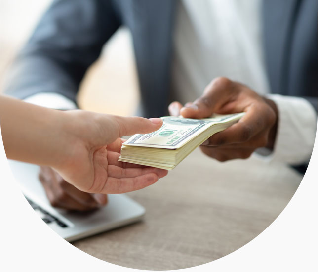 Hands exchanging money