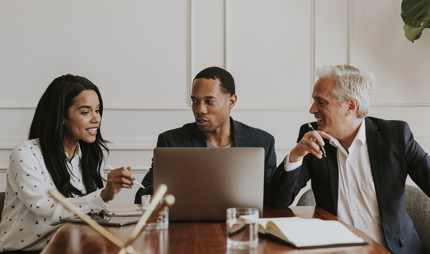 Business woman and men are discussing