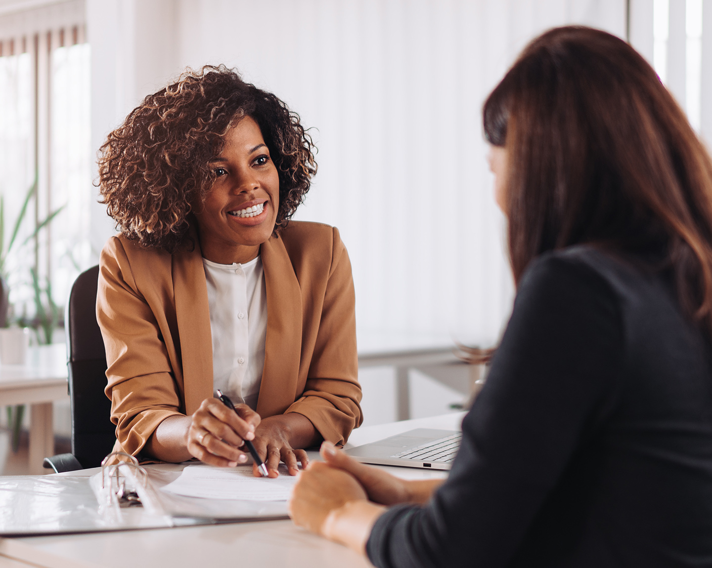 Banker is consulting a customer