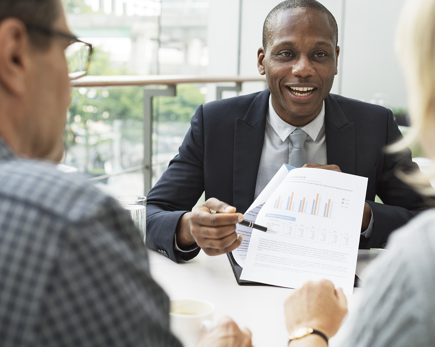 Banker is talking to customers