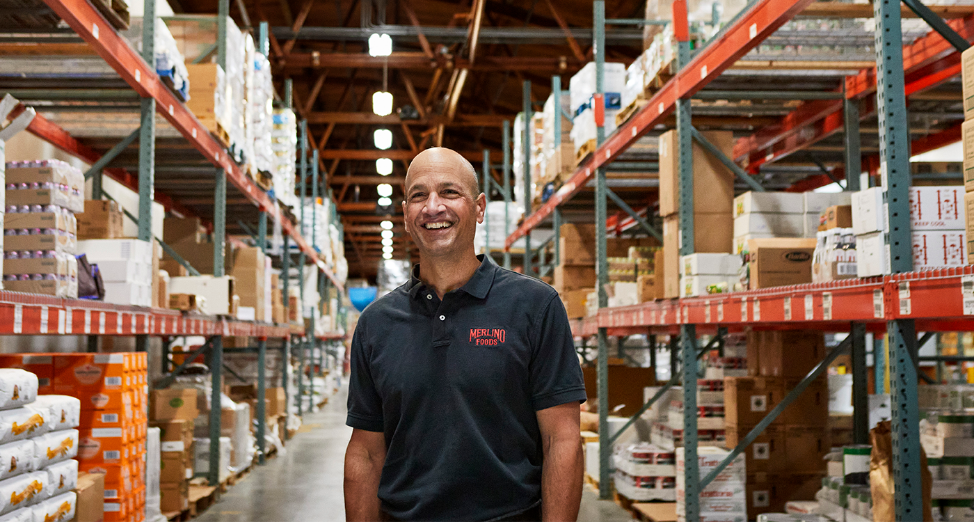 Umpqua client standing in warehouse